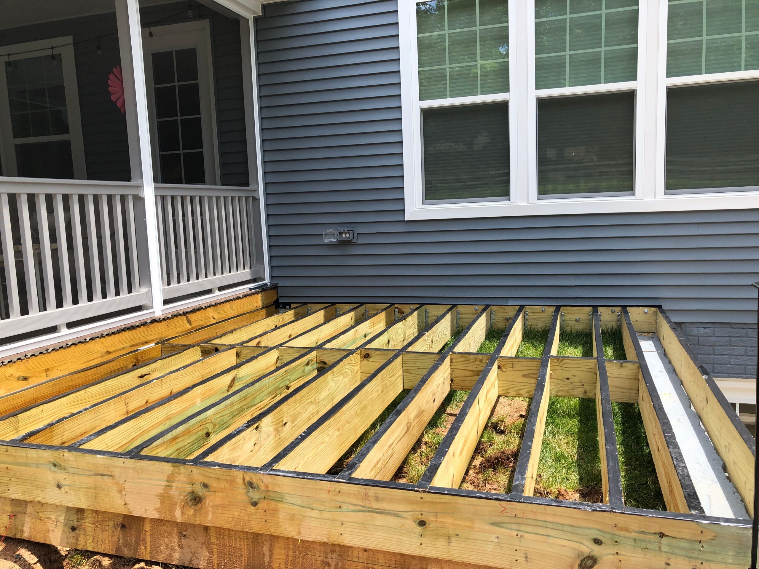 Boosting Property Value with Durable Outdoor Spaces: A Guide to Deck Maintenance and Protection